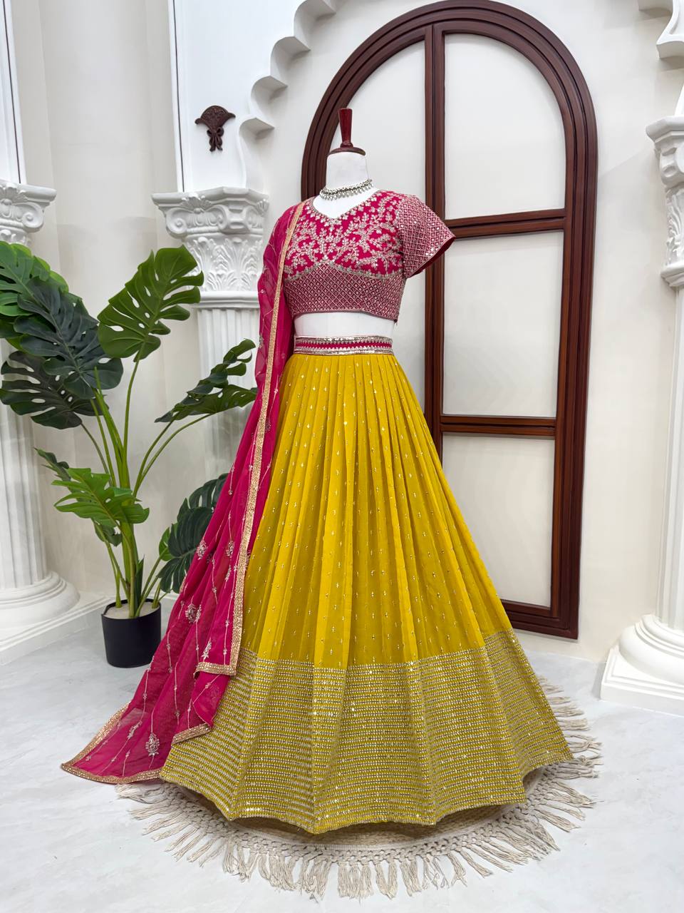 Vibrant Sunshine Yellow and Fuchsia Pink Designer Lehenga Choli with Dazzling Shimmer Embellishments
